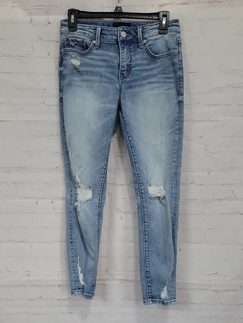 Buckle Light Blue Distressed Skinny Jeans
